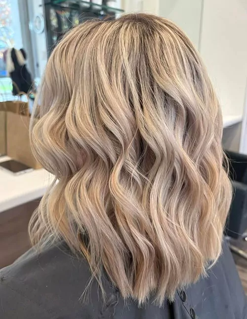 Blonde Wavy Lob With Dimensional Highlights