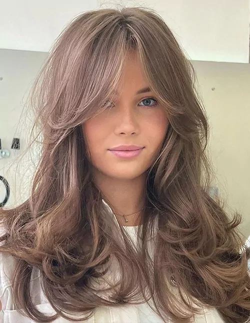 Long Modern Layers with Curtain Bangs