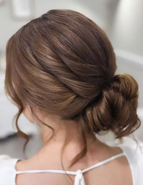 Low Textured Bun with Loose Face-Framing Pieces
