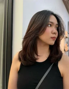 Medium Length Haircut With Shorter Layered Texture