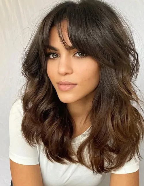 Shoulder-Length Waves with Curtain Bangs